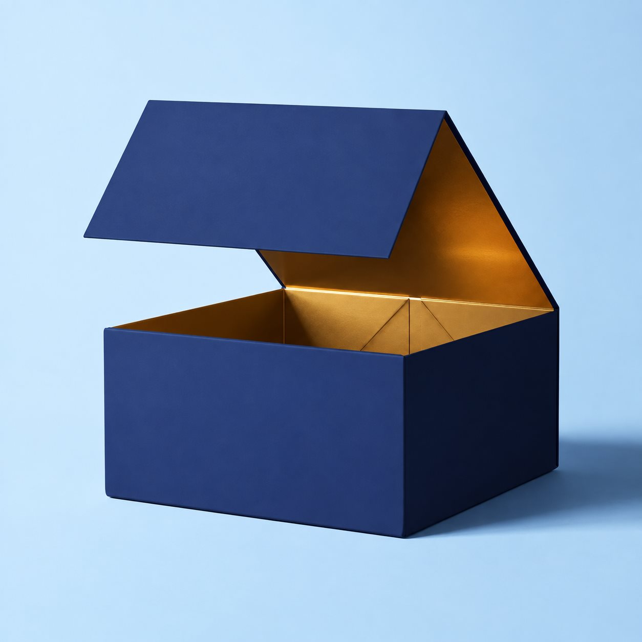 Dark blue hinged gift box with contrasting interior